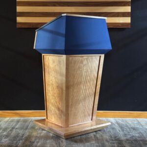 Executive Wood Products Ballistic Presidential podium (PRES500-AB) in front of american flag