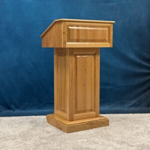 Wood Podium Cherry wood natural finish. Casters and wire management
